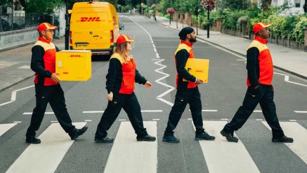 DHL couriers on the crosswalk