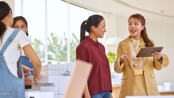 DHL employees talking to each other