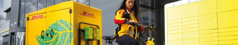 Bicycle-courier in front of a packing station.