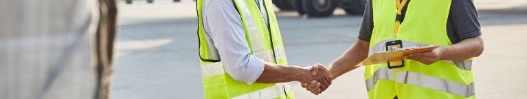 Two people shaking hands.