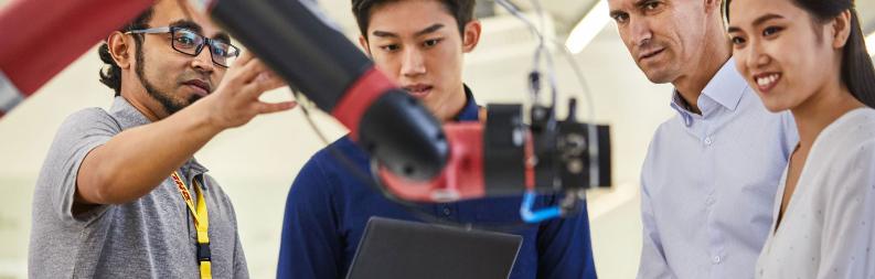 DHL employees with robot